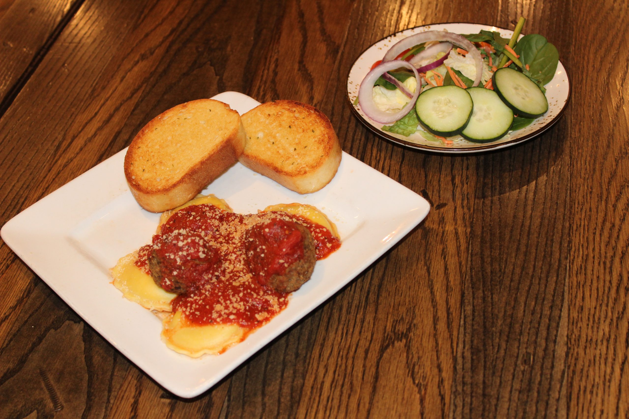 Cheese Ravioli with meatball and Marinara with garlic bread - 13.99