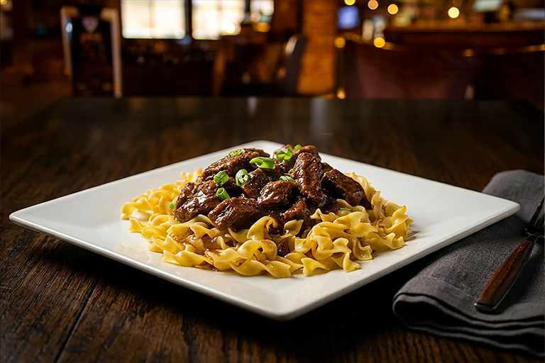 Beef Tips Over Egg Noodles